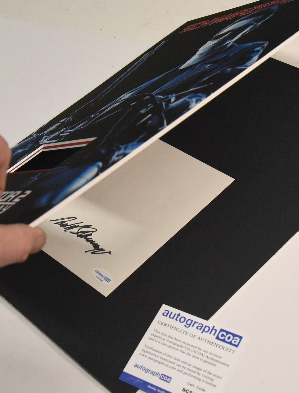 ARNOLD SCHWARZENEGGER autographed "Terminator 2" 12x16 custom mat with book page signature