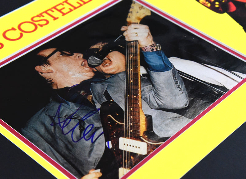 ELVIS COSTELLO autographed "My Aim Is True" 16x22 display